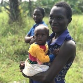 mother holding baby